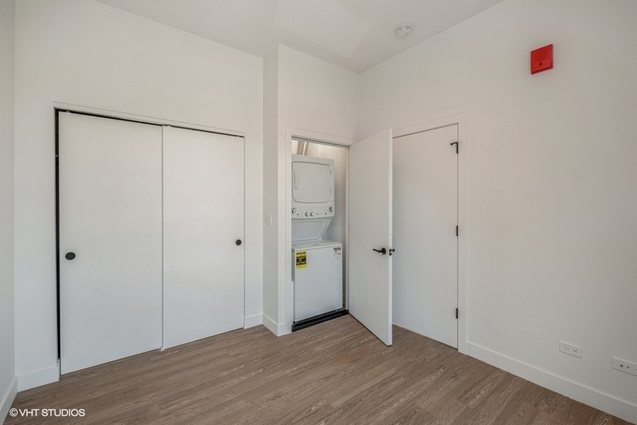 a small laundry room with a washer and dryer